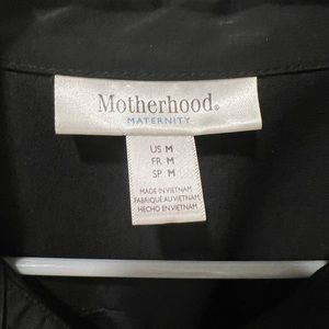 Black maternity dress size medium knee length worn 1 time.